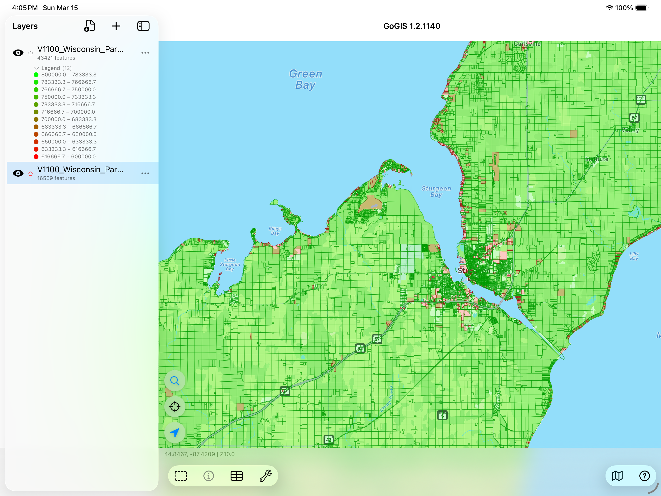 Dense polygon parcel data with color coding displayed on iPad in GoGIS