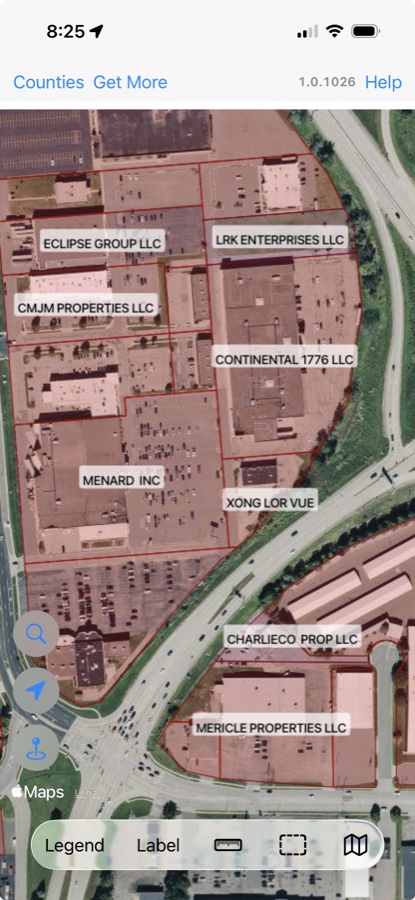 WI 2026 showing commercial parcel boundaries and business owner labels over aerial imagery
